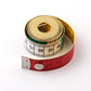 Measuring tape set of coiled rolls, green center band and red outer markings