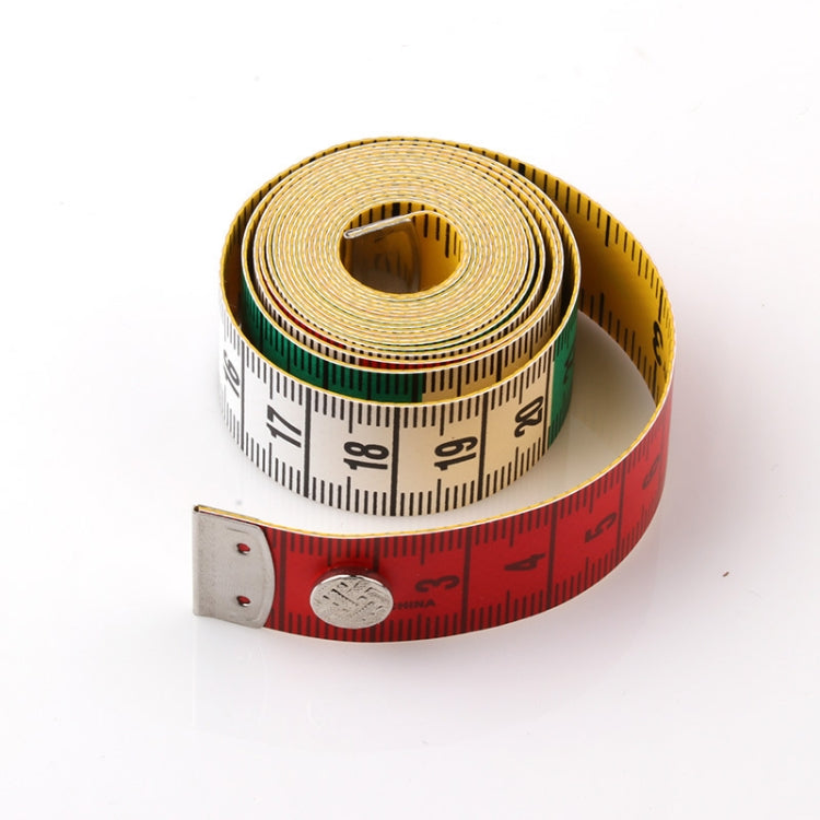 Measuring tape set of coiled rolls, green center band and red outer markings