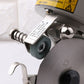 Electric fabric cutter blade assembly with labeled housing and circular cutting wheel