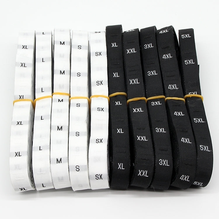 Polyester size labels roll with black and white tape, XS–5XL printed