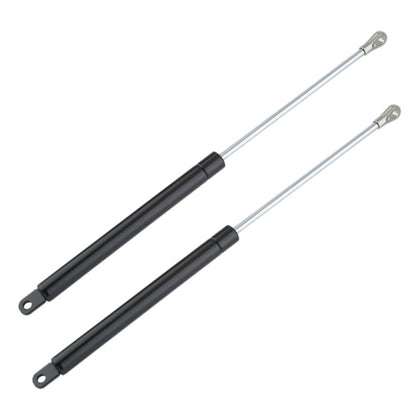 RV gas spring strut with black cylinder, silver rod, and eyelet brackets