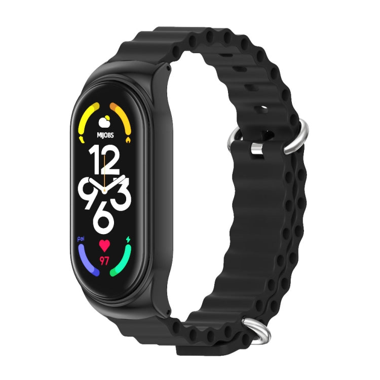 Black silicone watch band with smartwatch display, metal buckle and vent holes.