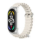 Light silicone watch band with perforations and metal buckle, off-white tone