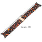Three-bead resin watch band with amber-orange and black gradient rectangular links.