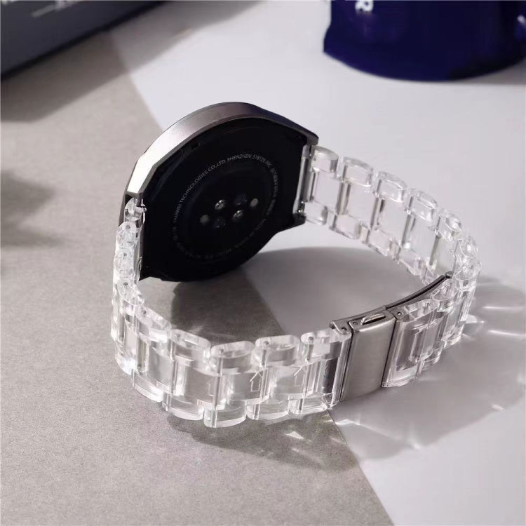 Three-bead resin watch band with transparent crystal links and silver-toned clasp.