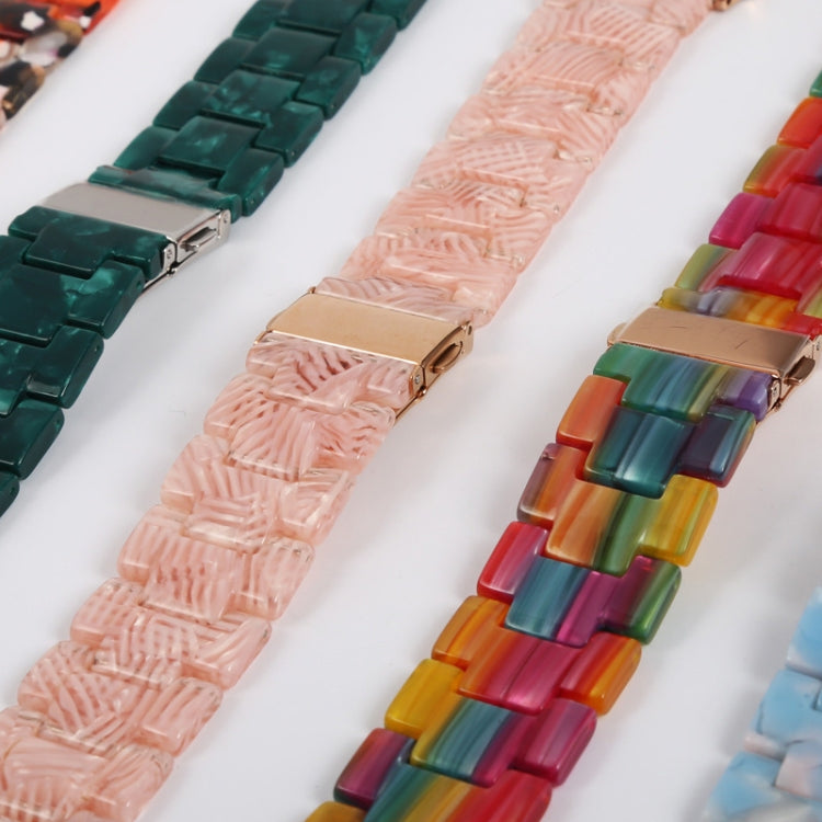 Colorful three-bead resin watch band links in assorted shades on display.