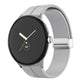 Black silicone watch band with folding buckle and silver clasp, shown on watch.
