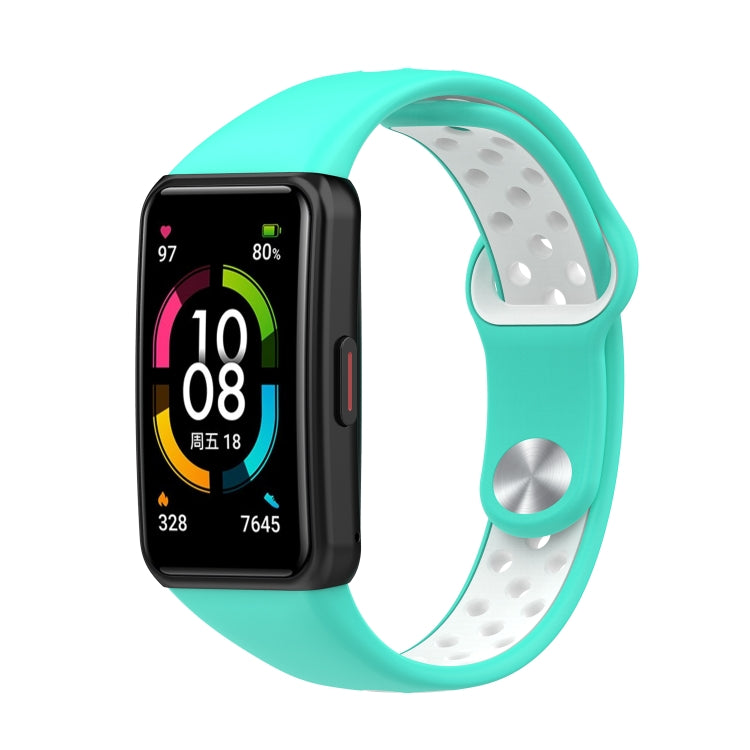 Two-color silicone watch band with reverse buckle, teal strap with light gray perforated underside