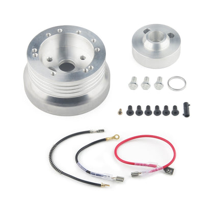 Polished steering wheel hub adapter kit with silver hub, wires, and mounting hardware