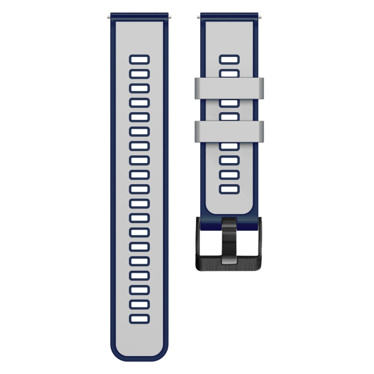 Vented two-piece silicone watch band with dark blue outer and light interior.