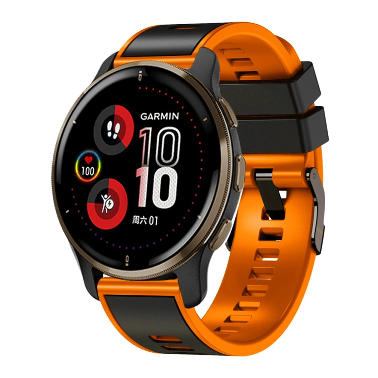 Two-tone silicone watch band in orange with dark gray buckle and vented links.
