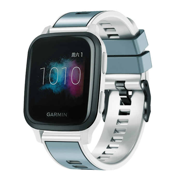 Two-color silicone watch band, teal top band and white strap.