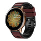 Two-color silicone watch band, maroon top band and black strap with clasp end.