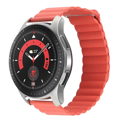 Orange magnetic loop watch band with metal buckle and smartwatch face