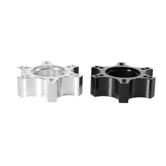 Wheel hub adapter showing silver and black options with center openings