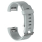 Grey silicone wrist strap with buckle, textured perforations and adjustable holes
