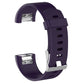 Dark purple silicone wrist strap with buckle, textured perforations and adjustment holes
