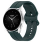 Dark green silicone watch band with clasp, rear strap holes, and flat groove design.