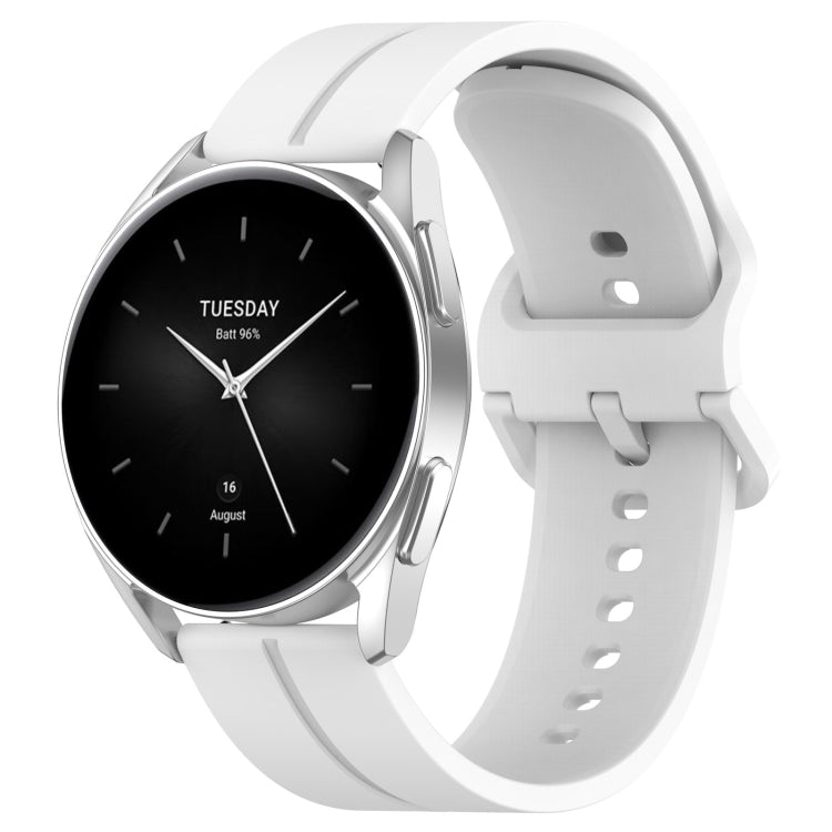 White silicone watch band, clasp side view with perforation holes and curved strap.