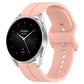 Silicone watch with groove band in light pink, black dial with day text and hands