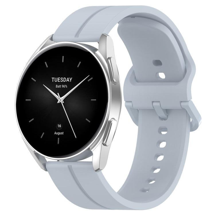 Silicone watch with groove band in light blue, black dial with day text and hands