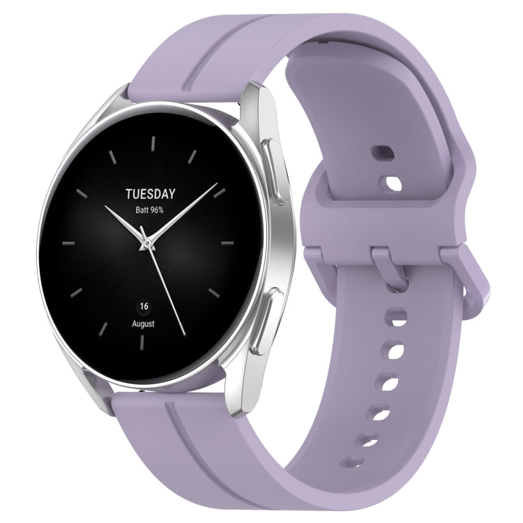 Silicone watch with groove band in light purple, black dial with day text and hands
