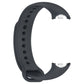 Dark gray smartwatch strap underside with two exposed stainless connector ports