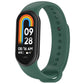 Dark green silicone smartwatch band with oval tracker body, perforated holes
