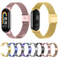 Milanese metal watch bands in pink and gold, with clasps and black fitness watches