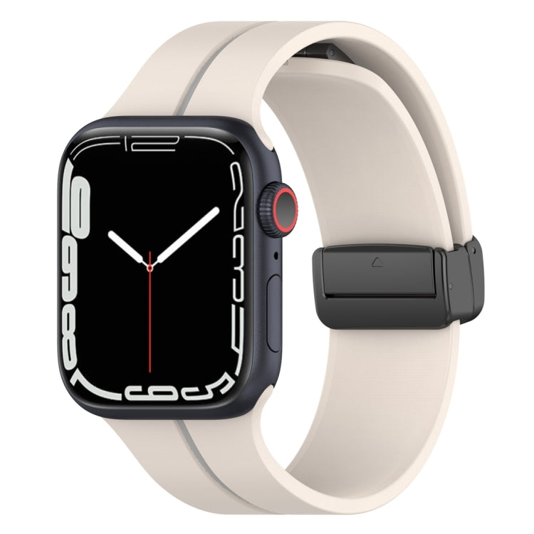 Two-color silicone watch band with folding buckle, light beige and black.
