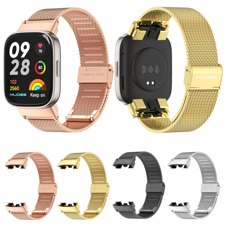 Assorted stainless-steel mesh watch bands in multiple colors with metal buckles.