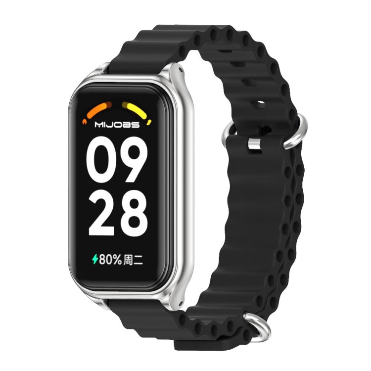 Metal shell silicone watch band in black with silver bezel and clasp