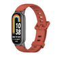 Orange+black breathable silicone watch band with perforations and adjustable buckle
