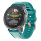 Teal silicone watch band with rose-gold buckle and adjustable holes