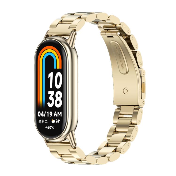 Light gold three-bead stainless steel watch band with round link accents, on smartwatch