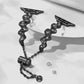 Ribbon wave metal watch band, black with wavy metal links and chain