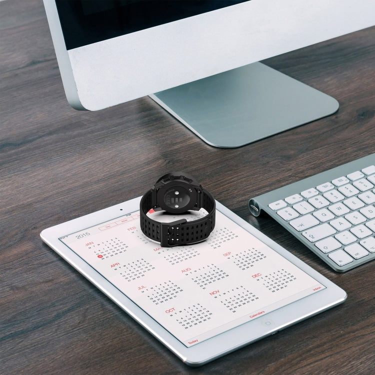 Black silicone watch band with perforated strap and clasp underside