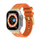 Silicone watch band with orange strap and gold-tone metal buckle for Apple Watch