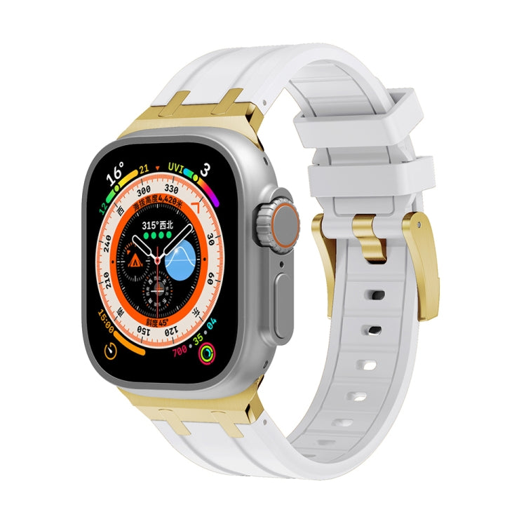 White silicone watch band with gold metal clasp and matching gold buckle