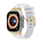 Silicone watch band with gold accents and light gray strap on silver case
