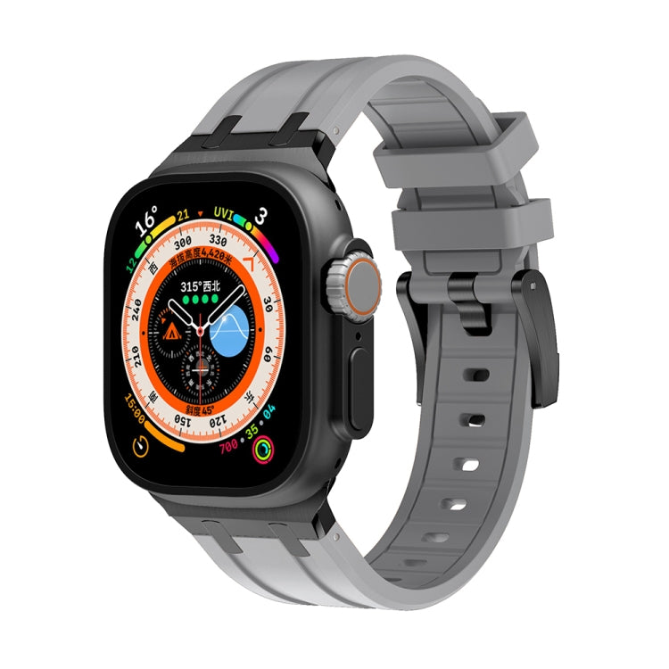 Silicone watch band with gray strap and dark-tone links for Apple Watch.