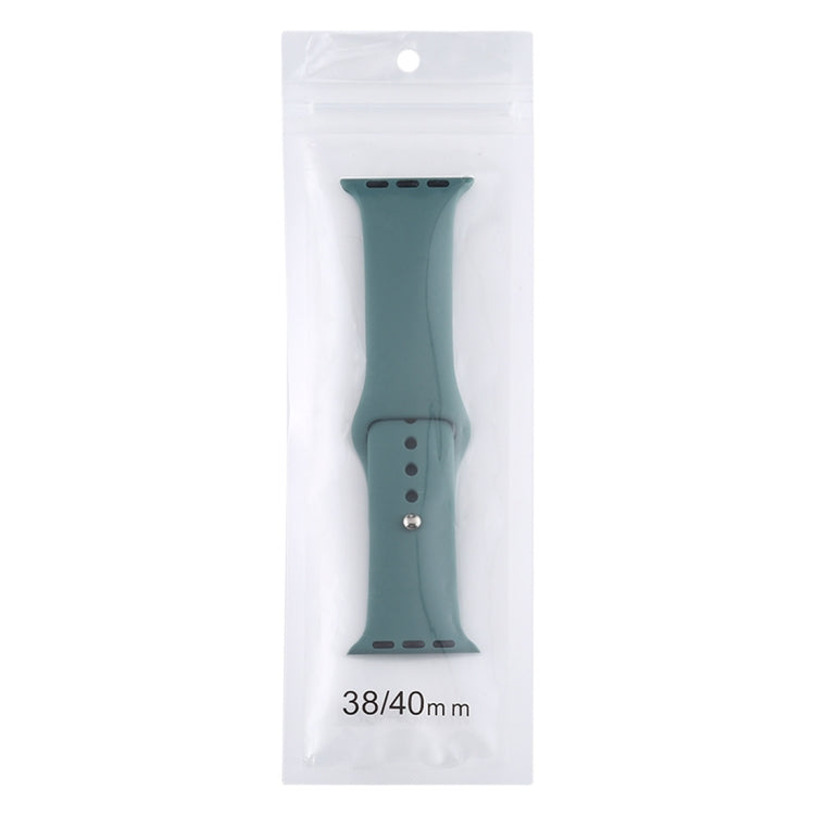 Teal silicone watch strap long section in retail sleeve with silver pin