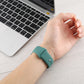 Teal silicone watch replacement strap long section worn on wrist