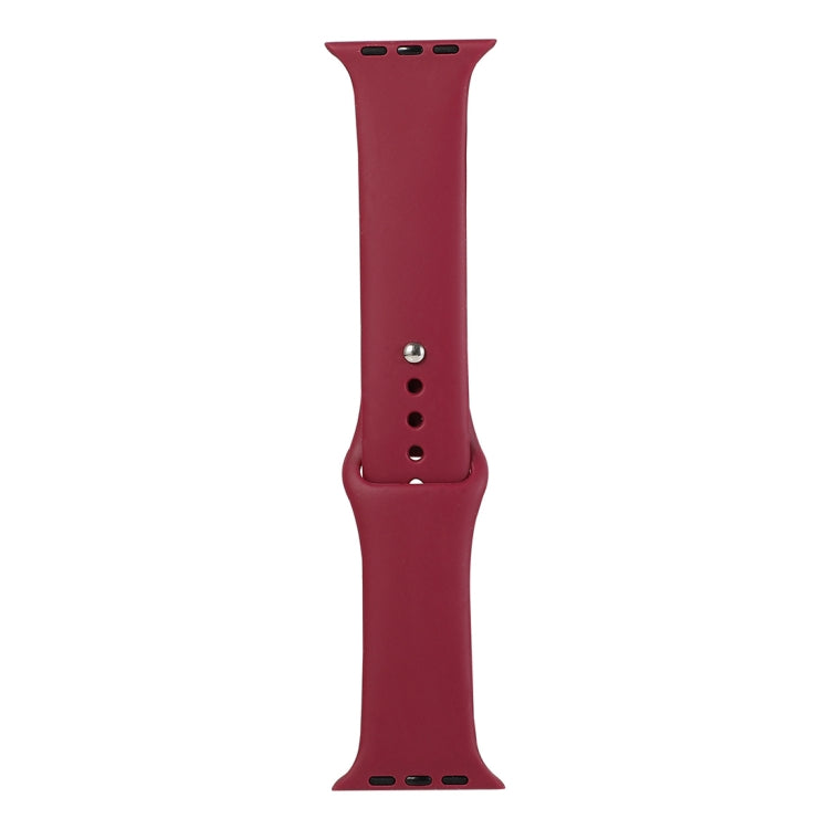 Deep red silicone watch strap long section with silver pin and adjustment holes