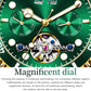 Green dial mechanical watch with gold hands and visible skeleton movement