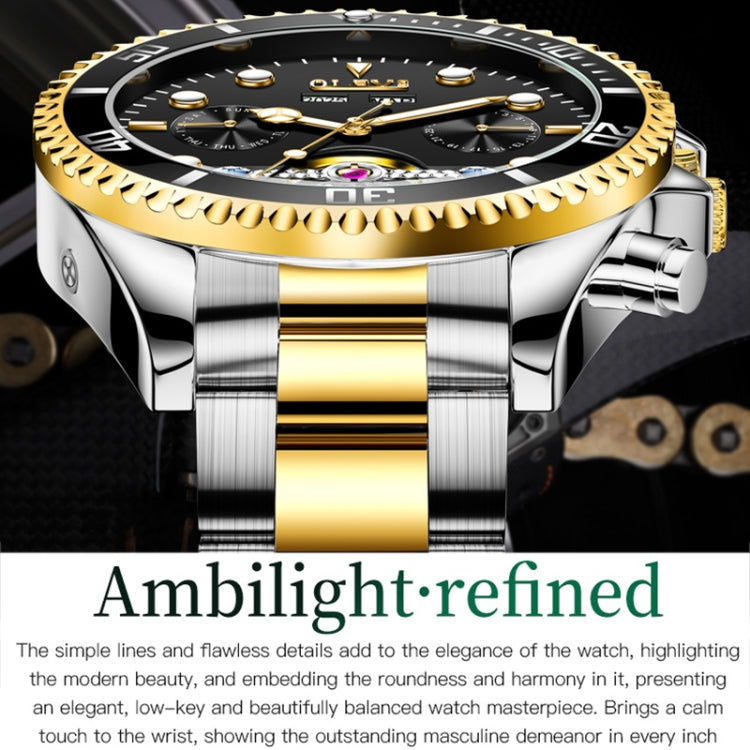 Two-tone mechanical watch close-up with green accents and gold ridged bezel edge