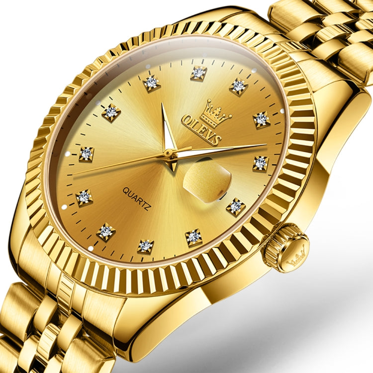Gold-tone quartz watch with diamond markers, crown detail, and round bezeled dial