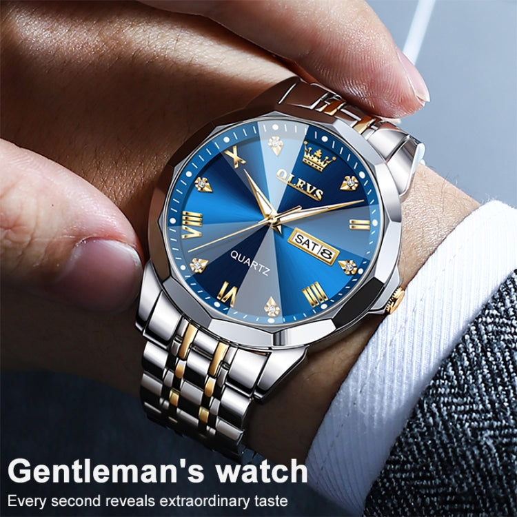 Close-up of two-tone quartz watch on wrist, blue dial with gold markers and SAT 8 window