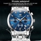 Men's multifunction quartz watch front with blue dial and water droplets on bezel