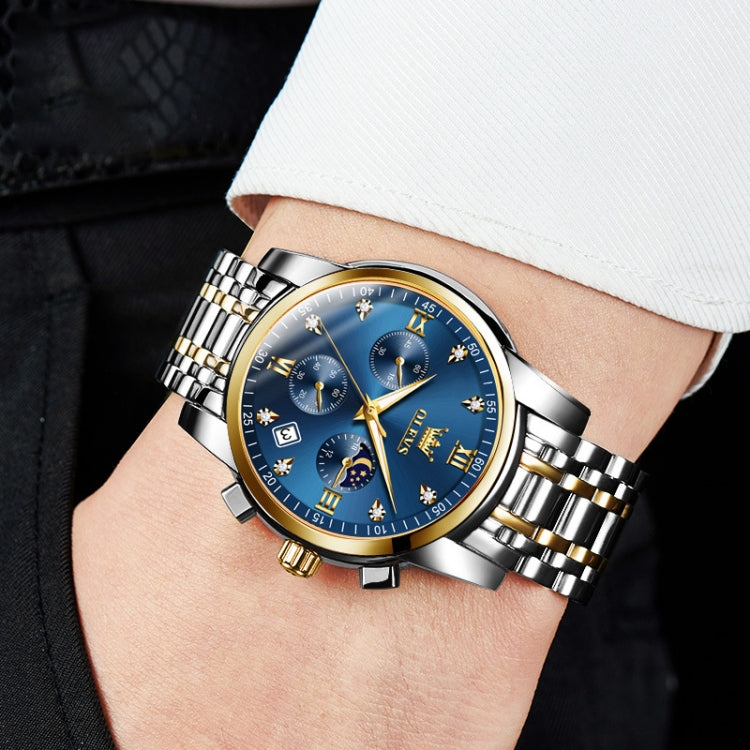 Men's multifunction quartz watch on wrist with blue dial and two-tone metal bracelet